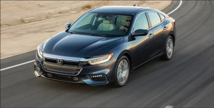  ?? HONDA PHOTOS ?? A 1.5-litre four-cylinder gasoline engine that makes 107 horsepower powers the 2019 Honda Insight. Two electric motors allow the Insight to run about 1.6 kilometres on pure electric and produce 129 horsepower for a combined 151 horsepower at 6,000 RPM.