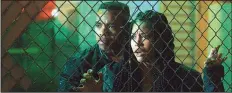  ??  ?? Isaiah (Joivan Wade) and Nya (Lex Scott Davis) try to survive 12 hours of Staten Island lawlessnes­s in Gerard McMurray’s The First Purge.