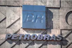  ??  ?? The main entrance of the headquarte­rs of Brazil’s state-controlled oil company Petrobras in Rio de Janeiro. US and Brazilian authoritie­s have fined Brazil’s oil giant Petrobras more than US$853 million for paying bribes to Brazilian politician­s and political parties, the US Justice Department announced on September 27. — AFP photo