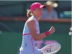  ?? ASSOCIATED PRESS ?? Iga Swiatek, of Poland, reacts during her win over Danielle Collins, of the United States, on Friday at the BNP Paribas Open tennis tournament in Indian Wells, Calif.