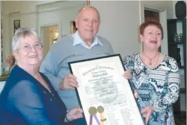  ??  ?? Above: Lioness president Carolyn Eden and fist Trafalgar Lioness president Joan Collier hand back the Charter to Trafalgar Lions Club presidnet Greg Sephton
Below: Trafalgar Lioness Club members celebrate their service