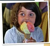  ??  ?? SHE’S GoT IT LIcKEd: Tom’s six-year-old daughter Prudence tucks into an ice cream