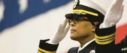  ?? BILLY SCHUERMAN/STAFF ?? Capt. Janet Days assumes the duties as Naval Station Norfolk’s 51st Commanding Officer during a change of command ceremony in Norfolk on Friday. Days becomes the first African American woman to serve as commanding officer in the 106-year history of the world’s largest Naval base.
