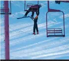  ??  ?? Open arms: Fellow skiers rushed to the boy’s rescue after he slid out of the chair lift at the family-run slope in Wisconsin