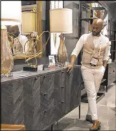  ?? Rachel Aston Las Vegas Review-Journal file ?? Interior designer Mikel Welch describes a product on display at the 2019 Las Vegas Winter Market. This year’s show runs Sunday through Thursday and is expected to draw 50,000 visitors.