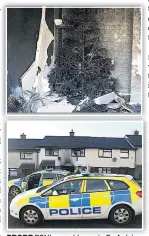  ??  ?? PROBE PSNI cars at home in Co Antrim, and, above, a charred Christmas tree