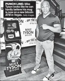  ?? Getty Images ?? PUNCH LINE: Mike Tyson looks like he can hardly believe his mug is now on a new bitcoin ATM in Vegas.