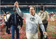  ?? Lynne Sladky / Associated Press ?? Alabama coach Nick Saban leaves the field after their win against Ohio State in an NCAA College Football Playoff national championsh­ip game last season in Miami Gardens, Fla.