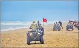  ?? PTI ?? Marine police patrol Puri beach to prevent people from venturing n
into the sea due to Cyclone Amphan on Sunday.