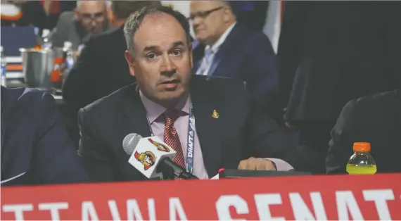 ?? BRUCE BENNETT/GETTY IMAGES FILES ?? It will be virtual, but Senators GM Pierre Dorion, seen at last year’s NHL draft, will likely be picking players in an early June draft this time around.