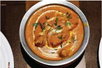  ?? — REUTERS ?? The butter chicken dish at the Moti Mahal restaurant in New Delhi on Tuesday.