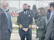  ?? ?? House Speaker Nancy Pelosi speaks to Santa Rosa Fire Department Chief Scott Westrope prior to Saturday’s press conference on infrastruc­ture as Rep. Mike Thompson (left) looks on.