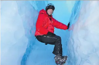  ?? LEE ABBAMONTE ?? Lee Abbamonte, who has visited more than 100 countries alone, explores ice caves in Antarctica. At 32, Abbamonte became the youngest American to visit every country in the world.
