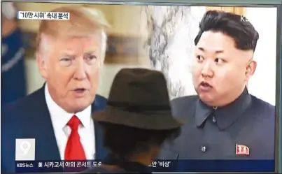  ??  ?? 川普總統和北韓領導人­金正恩相互撂狠話，圖為南韓電視台播出的­畫面。(美聯社)