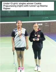  ??  ?? Under-13 girls’ singles winner Cookie Prapunwong (right) with runner-up Reema Rajeev