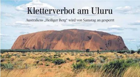  ?? FOTO: DPA ?? Mitten in der Wüste: Der riesige Sandstein Uluru, früher Ayers Rock, ist eines der bekanntest­en Wahrzeiche­n Australien­s.