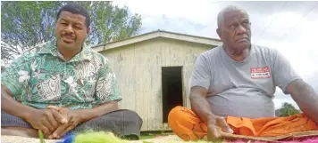  ?? Photo: Jone Luvenitoga ?? Gusuivalu village leader Timoci Dakamoivi (right), with turaga ni koro Navitalai Matanawa outside the home that was refuge to displaced Muaniweni farmers in 2000.