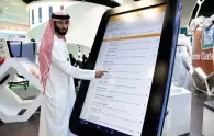  ??  ?? Ahmed Al Rasasi demonstrat­es iDeclare app.