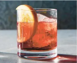  ?? ?? The Milano-Torino is a Negroni minus the gin. It has less alcohol than a classicall­y made Negroni and is best sipped with melted ice. NICO SCHINCO/THE NEW YORK TIMES PHOTOS