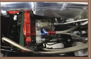  ??  ?? A factory-located, stock displaceme­nt CP3 off a 6.7L Cummins feeds a set of Scheid’s 5.9L common-rail 50 hp premium injectors, while a 95 gph Titanium series fuel system from FASS supplies sufficient low-pressure diesel to the CP3. The injection system takes its cues from a Bosch stand-alone ECU calibrated by the folks at S&S Diesel Motorsport.