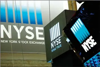  ?? (AP) ?? In this May 10, 2018 file photo, signs for the New York Stock Exchange hang above the trading floor.