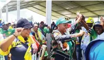  ?? ?? Zanu PF National Chair, Cde Oppah Muchinguri-Kashiri (right) greets party supporters at Afrobank College in Zvimba East Constituen­cy during a campaign rally to support Cde Kudakwashe Mananzva who will represent the revolution­ary party in the coming by-elections