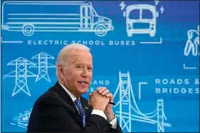  ?? (AP/Susan Walsh) ?? President Joe Biden speaks Wednesday during a virtual meeting from the South Court Auditorium at the White House complex in Washington to discuss the importance of the bipartisan Infrastruc­ture Investment and Jobs Act. Stories circulatin­g online incorrectl­y assert that $2.5 billion had been allocated toward a welcoming center for immigrants coming to the country illegally. The claims aren’t clear on the source of the supposed funding, but they imply a connection to a bipartisan infrastruc­ture plan approved by the Senate on Tuesday. In fact, the U.S. Customs and Border Protection confirmed, the CBP projects funded by the bill did not include any “welcoming center.” The bill funds a range of infrastruc­ture improvemen­t projects at land ports of entry, including repairs, expansion and modernizat­ion of border facilities that, in some cases, have not been updated in decades.