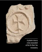  ??  ?? A plaster stucco cross excavated at the Sir Bani Yas monastery