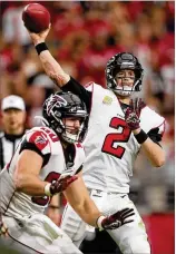 ?? GETTY IMAGES ?? Falcons QB Matt Ryan leads the NFL with 15 TD passes and is on pace to surpass 5,000 passing yards for the first time in his career.