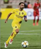  ?? Vahid Salemi / Associated Press ?? Qatar’s Al-Sadd player Xavi Hernandez, former Barcelona and Spain midfielder, controls the ball during an AFC Champions League match at the Azadi stadium in Tehran, Iran.