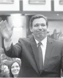  ?? SCOTT KEELER/TAMPA BAY TIMES ?? Gov. Ron DeSantis waves to members of the Florida Legislatur­e last month during a joint session of lawmakers. He’s proven to be a popular governor, writes Sun Sentinel Columnist Paula Dockery.