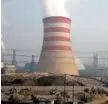  ?? ASSOCIATED PRESS FILE PHOTO ?? Smoke and steam spew from the sprawling complex that is a part of the Jiujiang steel and rolling mills in Qianan in northern China’s Hebei province.