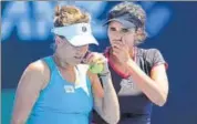 ?? AFP ?? Sania Mirza (right) and Barbora Strycova lost their secondroun­d match to Samantha Stosur and Zhang Shuai in Dubai.