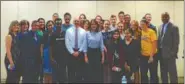  ?? PHOTO COURTESY OF UPPER DARBY SCHOOL DISTRICT ?? Comedian Tina Fey takes a photo with district administra­tors, faculty and students during her recent trip to Upper Darby High School.