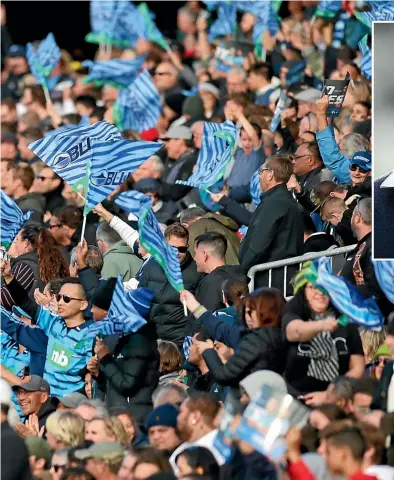  ?? GETTY IMAGES ?? A sea of blue amid a capacity crowd at Eden Park helped sweep the Blues to victory over the Hurricanes in Auckland on Sunday.