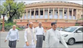  ?? PTI ?? Congress leader Digvijay Singh (second from left), CPI member D Raja and JD(U) leader Ali Anwar Ansari leave after attending the monsoon session of Parliament in New Delhi on Monday.