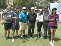  ??  ?? TO THE FORE. PAL Media Players (Al Mendoza, Jayjay Neri, Tiffany Neri, Jake Ayson and Imee Garcia) pose with PAL president Jimmy Bautista and PAL vice president for Mindanao Vic Suarez on the tee mount of the first hole in Cebu Country Club.