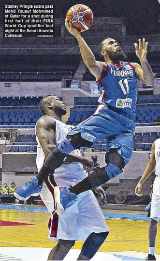  ?? JUN MENDOZA ?? Stanley Pringle soars past Mohd Yousuf Mohmmed of Qatar for a shot during first half of their FIBA World Cup qualifier last night at the Smart Araneta Coliseum.