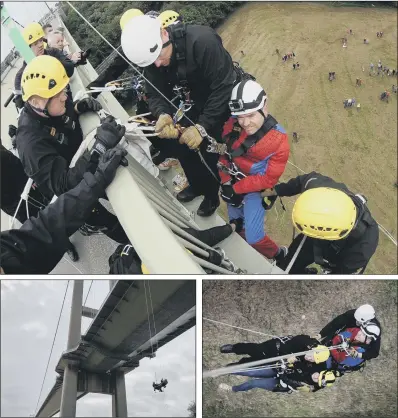  ?? PICTURES: SIMON HULME. ?? DON’T LOOK DOWN: Jason Liversidge, who is virtually paralysed with motor neurone disease, in his Spider-Man suit with his wife Liz and Bridlingto­n firefighte­rs, abseiling down the Humber Bridge to raise awareness and funds for charity.