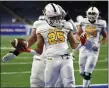  ?? GEORGE SPITERI — FOR MEDIANEWS GROUP ?? Triston Nichols reacts after catching a 9-yard touchdown pass from Brady Drogosh during the first half of the state Division 2 championsh­ip game at Ford Field on Friday.