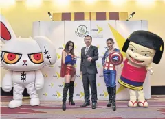  ??  ?? Mr Nuttapon with Wonder Woman, Captain America and other characters.