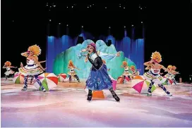  ?? [PHOTO PROVIDED] ?? Princess Anna from the film “Frozen” performs in the musical number “In Summer” with members of the ensemble for “Disney On Ice presents Dare to Dream.” Skater Tosha Hanford is portraying Princess Anna, and Ada native Jennifer Payne is one of the ensemble performers. The ice show is playing through Tuesday at the Oklahoma State Fair.