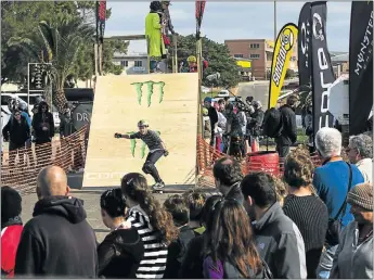  ??  ?? BEACHFRONT BLISS: Crowds gather at the Jeffreys Bay Winterfest to enjoy a host of activities aimed at attracting people to the coastal town during the off-peak season