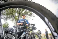  ??  ?? Sgt. Lopez, who runs the Santa Fe police bike patrol team, participat­es in a training session Wednesday on the Acequia Trail. ‘I would say, for the most part, all of the trails we have here are safe,’ he said.