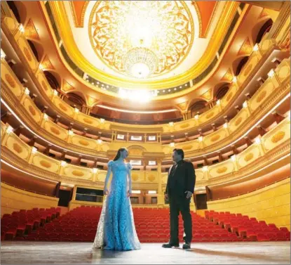  ?? PHOTOS PROVIDED TO CHINA DAILY ?? Soprano Guo Chengcheng and tenor Li Shuang perform at the opening of the China National Opera House on April 20.