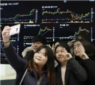  ?? WOOHAE CHO/THE NEW YORK TIMES ?? Nowhere has the public frenzy for virtual currency, like bitcoin, been more feverish than in South Korea.