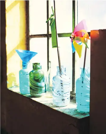  ?? IKEA ?? Ikea designer Iina Vuorivirta’s uniquely patterned vases are made of glass waste.