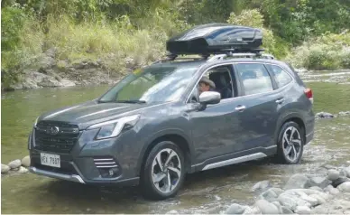  ?? ?? The Subaru Forester crossing a river.