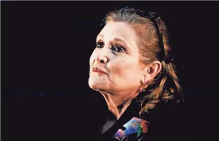  ?? EUROPEAN PRESS AGENCY ?? Actress and author Carrie Fisher, who passed away Tuesday in Los Angeles after having a medical emergency on board a flight Friday, is best remembered as Princess Leia in the original “Star Wars,” and she reprised the role in 2015 in “Star Wars: The Force Awakens.”