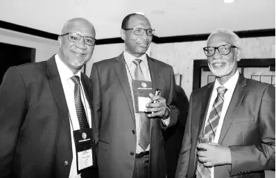  ?? CONTRIBUTE­D ?? Robert Kinlocke (centre) contribute­d immensely to the developmen­t of local and regional shipping and here he is pictured at a recent meeting of the Caribbean Shipping Associatio­n’s Executive Conference with Clyde Donaldson (left) and Condell Stephenson, Port Captain for Hoegh Autoliners.